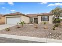 Charming single-story home features a well-maintained landscape, a two-car garage and a welcoming entrance at 2999 Gettysburg Ave, Henderson, NV 89052