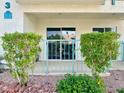 Balcony view with lush greenery and a glimpse of condo parking at 3550 Bay Sands Dr # 1005, Laughlin, NV 89029