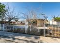 Charming single-story home with decorative front fence and easy-care landscaping in a residential neighborhood at 3700 Hickey Ave, North Las Vegas, NV 89030
