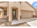 Charming single-story home featuring a low maintenance front yard and attached two car garage at 4071 Blue Manor Ln, North Las Vegas, NV 89032