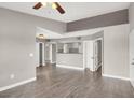 Spacious living room with open view to kitchen and ample hallway access to bedrooms and bathrooms at 45 Maleena Mesa St # 1424, Henderson, NV 89074