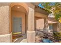 Charming front entrance with a covered porch and a welcoming atmosphere at 6046 Bassio Ave, Las Vegas, NV 89141