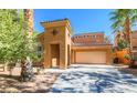 Two-story home with stone accents, covered entry, and a two-car garage on a sunny day at 1091 Casa Palermo Cir, Henderson, NV 89011
