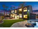 Beautiful backyard featuring a sparkling pool, manicured lawn, and an outdoor seating area, perfect for relaxation at 3924 Diamond Ridge St, Las Vegas, NV 89129