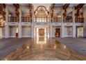 Impressive foyer with hardwood floors, soaring ceilings, and open access to living spaces, creating a grand entrance at 42 Gulf Stream Ct, Las Vegas, NV 89113