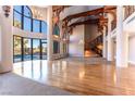 Elegant living space showcasing high ceilings, abundant natural light, and a seamless connection to outdoor living at 42 Gulf Stream Ct, Las Vegas, NV 89113
