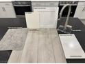 This shows an upgraded kitchen with a Moen faucet, white cabinets and stainless steel appliances at 9095 Rivington Ave, Las Vegas, NV 89148