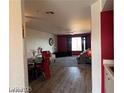 Open-concept living room and dining area featuring wood-look flooring at 2064 Mesquite Ln # 304, Laughlin, NV 89029