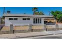 Beautiful home with decorative white fencing and a freshly landscaped front yard at 2105 Berkley Ave, Las Vegas, NV 89101