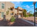 An inviting exterior enhanced with mature trees and shrubs, providing shade and curb appeal, making the home welcoming at 3937 S Torrey Pines Dr, Las Vegas, NV 89103