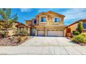 Charming two-story home with attached two car garage and landscaped front yard at 524 Blanche Ct, Henderson, NV 89052