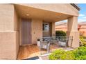 Inviting front porch with seating area, perfect for enjoying a morning coffee or evening relaxation at 601 Bear Grass St, Las Vegas, NV 89144
