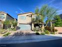 Charming two-story home features a two-car garage, tidy landscaping, and inviting front porch at 10152 Tenaya Meadows St, Las Vegas, NV 89178
