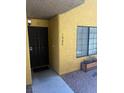 Exterior view of front door with window and small planter at 2700 N Rainbow Blvd # 1084, Las Vegas, NV 89108
