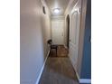 Interior view of hallway with chair and front door at 2700 N Rainbow Blvd # 1084, Las Vegas, NV 89108