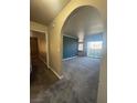 Living room with carpet and slider door to balcony at 2700 N Rainbow Blvd # 1084, Las Vegas, NV 89108