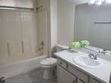 Bathroom featuring a sink vanity and toilet next to a shower-tub combination at 4356 Pittsfield St, Las Vegas, NV 89115