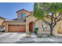 Charming two-story home featuring a two-car garage, desert landscaping, and an inviting arched entryway at 8022 Severn Valley St, Las Vegas, NV 89139