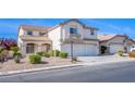 Charming two-story home with a three car garage, well maintained landscaping, and a welcoming entrance at 8321 Gorsky Ave, Las Vegas, NV 89131