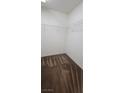 Walk-in closet with carpet flooring, white walls and ceiling and wire shelving at 8626 Anderson Dale Ave, Las Vegas, NV 89178