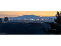 Panoramic city skyline view from rooftop showcases vibrant city lights at sunset at 1259 N Hollywood Blvd, Las Vegas, NV 89110