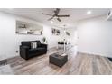 Open-concept living room with neutral tones and an adjacent dining area at 3120 S Eastern Ave # 5, Las Vegas, NV 89169