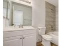 Bathroom featuring modern finishes, tile surround, white vanity, and a clean, contemporary aesthetic at 3151 Soaring Gulls Dr # 2002, Las Vegas, NV 89128