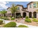 Charming two-story home featuring a welcoming front porch, well-maintained landscaping, and a cozy curb appeal at 3166 Via Da Vinci, Henderson, NV 89044