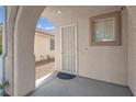Covered entry featuring a security door and doorbell at 3186 Lapis Beach Dr, Las Vegas, NV 89117