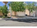 Charming home featuring a two-car garage, drought tolerant landscaping and covered entry at 3186 Lapis Beach Dr, Las Vegas, NV 89117