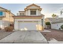 Well-maintained two-story home with a two-car garage, desert landscaping, and a clean, welcoming facade at 3525 Tuscany Village Dr, Las Vegas, NV 89129