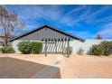 Charming home featuring a pergola, desert landscaping, and ample natural light at 3924 Blackford Pl, Las Vegas, NV 89102