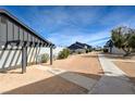Cozy townhome community features desert landscaping and paved walkways at 3924 Blackford Pl, Las Vegas, NV 89102