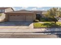 Attractive single-story home features a spacious three-car garage and well-maintained landscaping at 240 Jumping Springs Pl, Henderson, NV 89012