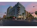 Beautiful daytime exterior shot of high rise apartment building and palm trees at 353 E Bonneville Ave # 632, Las Vegas, NV 89101