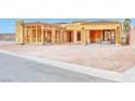 New home construction exterior displaying open framing, offering a glimpse into customizable modern living at 54 Bellissima Lago Ct, Henderson, NV 89011