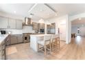 Well-equipped kitchen with stainless steel appliances and a center island at 7307 Grace Estate Ave, Las Vegas, NV 89113