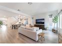 Spacious living room featuring hardwood floors and contemporary decor at 7307 Grace Estate Ave, Las Vegas, NV 89113