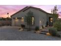 Charming single story home boasts a brick paved driveway and well-maintained landscaping at 91 Alta Cascata Pl, Henderson, NV 89011