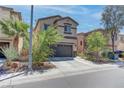 Lovely two-story home with a well-kept front yard, a two-car garage, and desert-friendly landscaping at 9844 Red Horse St, Las Vegas, NV 89143
