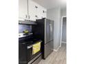 Functional kitchen with stainless steel refrigerator at 1331 Smoke Tree Ave, Las Vegas, NV 89108
