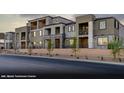 Newer model townhome exterior featuring neutral colors, balconies, and landscaping at 147 Harmonica Ave # Lot 24, Henderson, NV 89015