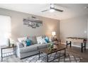 Cozy living space with a plush sofa, stylish coffee table, and foosball table at 1511 Living Desert Dr # C, Las Vegas, NV 89119