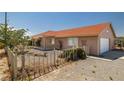 Charming single-story home with a low-maintenance front yard and a warm, inviting facade at 2090 S Ambush St, Pahrump, NV 89048