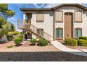 Inviting condo featuring well-maintained landscaping, and private entrance staircase at 2305 W Horizon Ridge Pkwy # 3713, Henderson, NV 89052