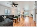 Spacious living room with hardwood floors, fireplace and neutral decor at 590 Tam O Shanter, Las Vegas, NV 89109