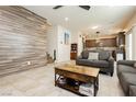 Cozy living room with tile flooring, recessed lighting, and open floor plan at 8929 Sleepy Panda Ave, Las Vegas, NV 89148
