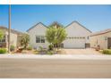 Attractive single-story home with desert landscaping and two-car garage at 8968 Skye Treeline St, Las Vegas, NV 89166