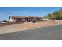 Lovely single-story residence showcasing desert landscaping and eye-catching brick accents at , Henderson, NV 89015