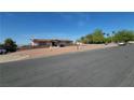 Pleasant single-story house featuring low-maintenance landscaping and charming brick details at , Henderson, NV 89015